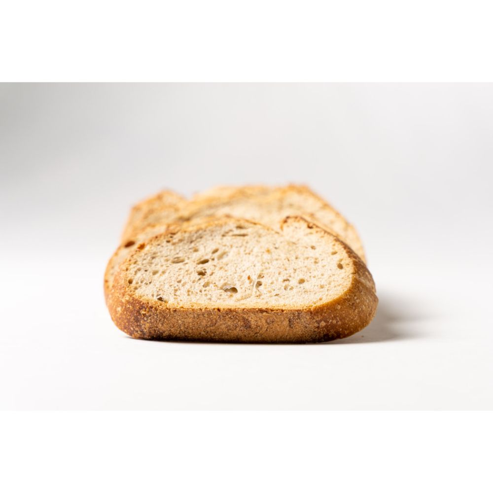 Photo of slices of mountain dough from a perspective from the front of the slice, all slices leaning over onto eachother.